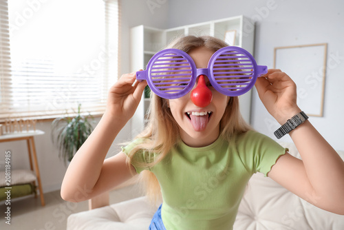 Little girl in funny disgui...