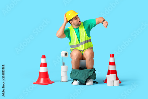 Shocked male worker looking...