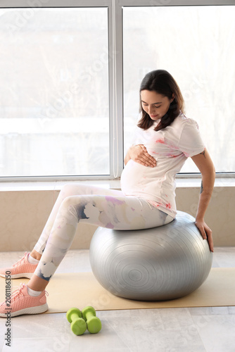 Beautiful young pregnant wo...