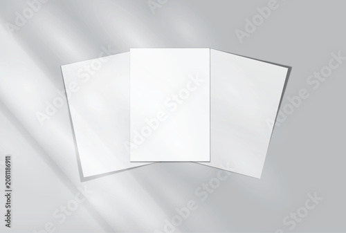 Blank white A4 paper sheets mockup on background with elegant organic shadow overlay. Perfect for displaying stationery designs, flyers, posters, branding, Ads and print design presentations