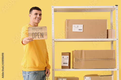 Male online store seller wi...