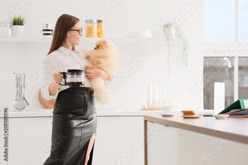 Young businesswoman with cu...