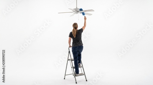 Photorealistic person viewed from behind, no face, dusting ceiling fan, reaching up, isolated pure white backdrop