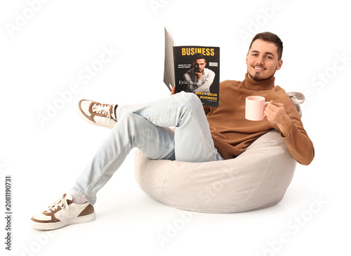 Young man with cup of tea r...
