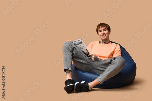Handsome young man in beanb...