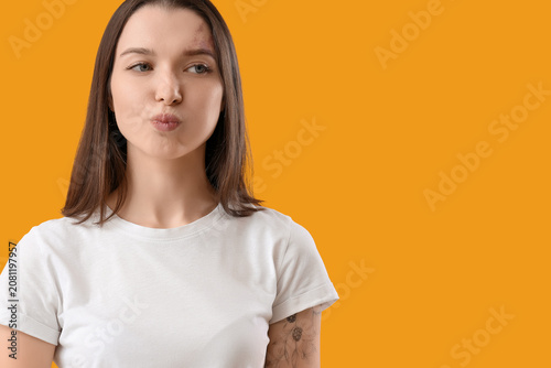 Young woman doing face buil...