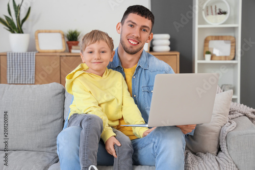 Little boy with his father ...