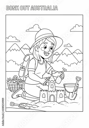 Girl building sandcastle at beach with mountains in background.