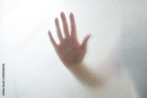 Принти на полотні Diffused silhouette of female hands through plastic