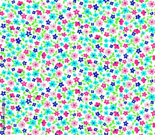 Seamless floral pattern with colorful star and flower shapes on light background