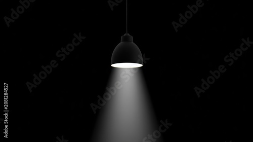 Modern black hanging pendant lamp glowing with bright light in the dark