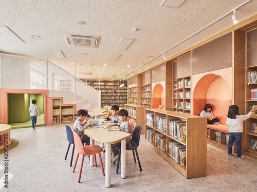 Students in a modern elementary school library
