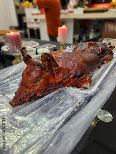 Freshly roasted whole pig with crispy crackling skin