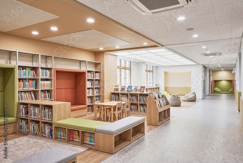calm elementary school reading nook with natural light and copy space