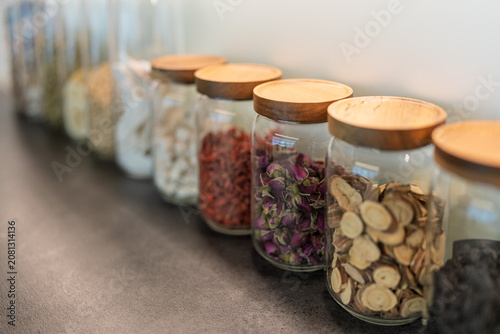 Obraz na płótnie Chinese Storage Jars Displaying Chinese Herbal Medicines and Flower Teas