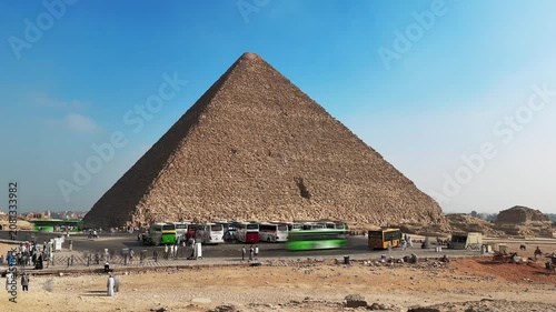 Timelapse of Tourist Buses and Crowds Arriving at the Great Pyramid of Khufu at Giza Necropolis