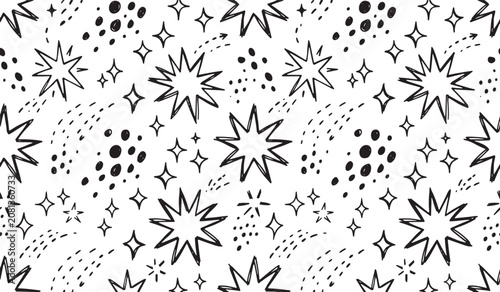 Photos Seamless pattern of hand drawn black cosmic stars and celestial particles on whi