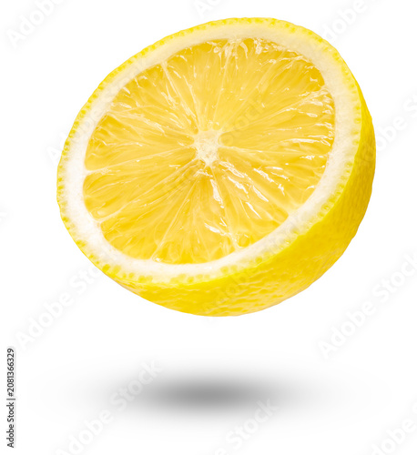 Fresh yellow lemon fruit half slice floating or levitating in the air, isolated on white background. Juicy organic citrus, studio shot with clipping path