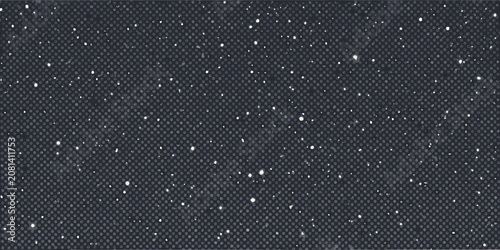 фотографія Dark textured background speckled with bright scattered points of light