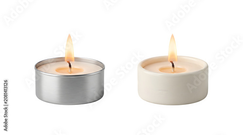 Two lit tealight candles burning with warm flame glow tealight decoration relaxation atmosphere peaceful wellness meditation illumination spiritual isolated meltdown serenity interior