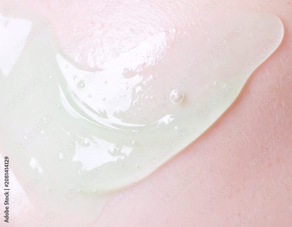Fototapeta premium Close-up of Transparent Cosmetic Gel Texture with Water Bubbles 