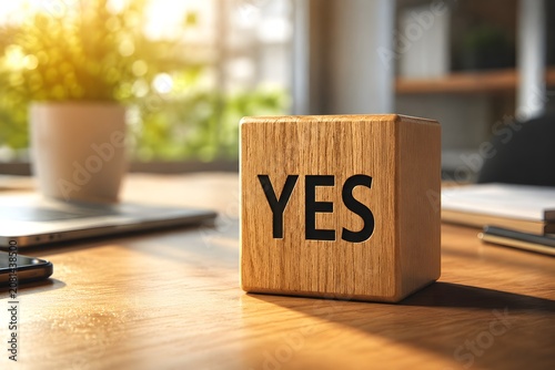 Wooden Cube with YES Text on Modern Office Desk – Positive Decision and Business Success Concept. 