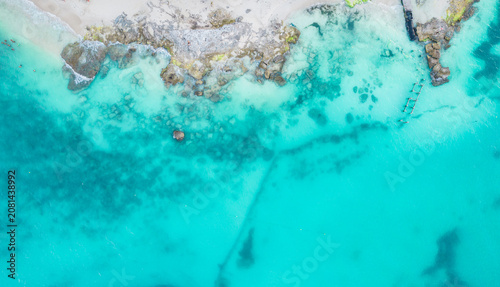 Принти на полотні Aerial view of sandy beach and ocean with small waves in Cancun, Mexico