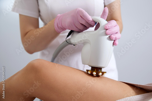 Photography Woman Having Laser Treatment On Thigh