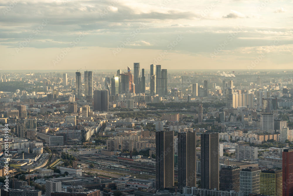 Obraz premium Moscow aerial panorama with Moscow city district view. Skyscrapers in the center of the capital. Panorama of the Russian city during sunset. Russian architecture