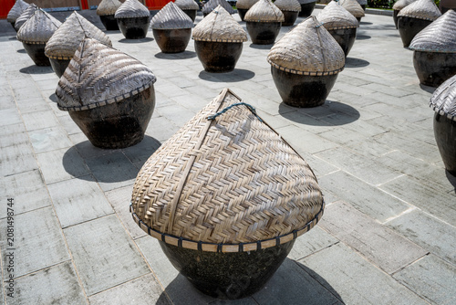 Quadro su tela Background material on the traditional earthenware jar sun-drying process of soy