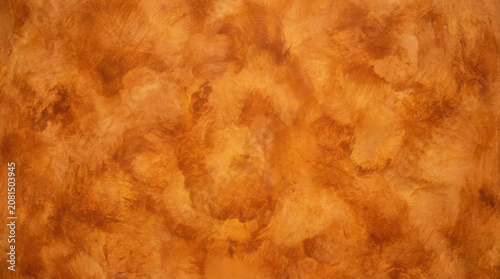 Abstract textured background with warm orange and brown tones