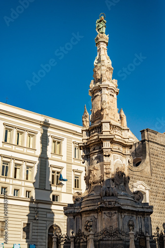View of the obelisk in the center of Piazza del Gesu in Naples