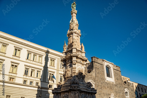 View of the obelisk in the center of Piazza del Gesu in Naples