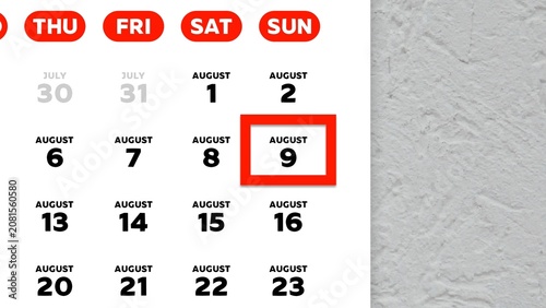 Close-up of August 9th date marked with a red cursor on a 2026 wall calendar