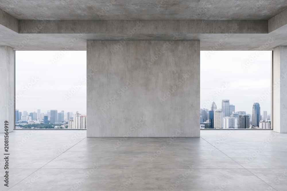Obraz premium The Empty Concrete Room Framed by Large Windows Overlooking City Skyline