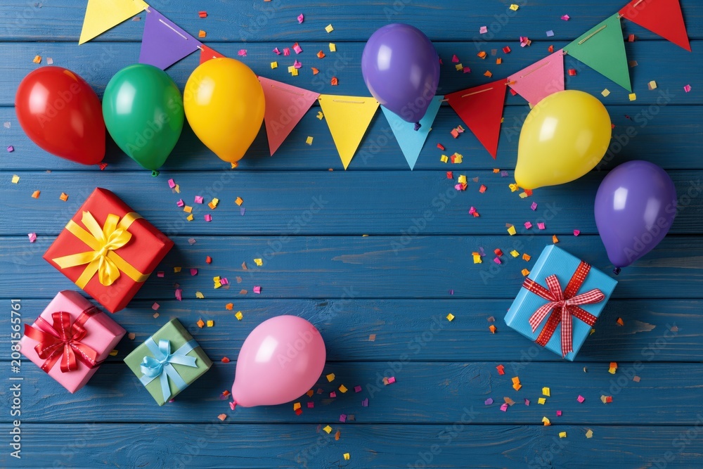 Fototapeta premium The Balloons and Gifts Create a Festive Birthday Scene on Blue Wood
