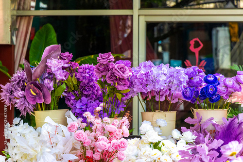 Flower and decoration shop street stall with traditional decorations Thailand.