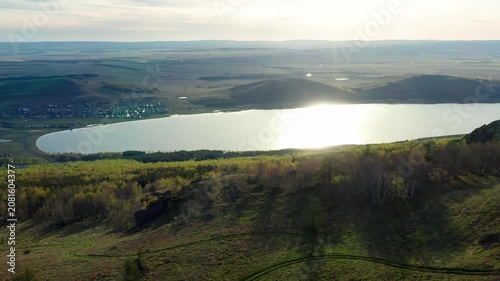 Southern Urals in spring: Irendyk ridge and Talkas Lake at sunset.