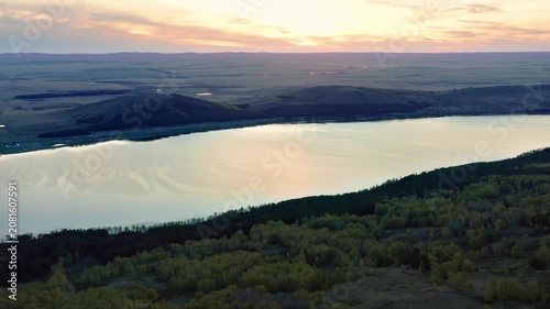 Southern Urals in spring: Irendyk ridge and Talkas Lake at sunset.