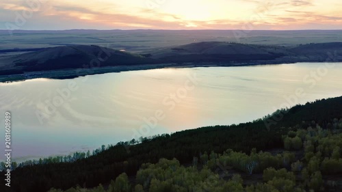 Southern Urals in spring: Irendyk ridge and Talkas Lake at sunset.