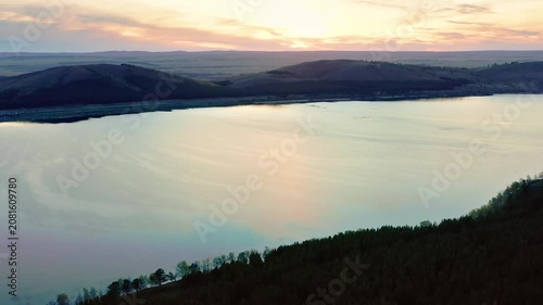 Southern Urals in spring: Irendyk ridge and Talkas Lake at sunset.