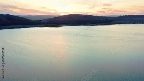 Southern Urals in spring: Irendyk ridge and Talkas Lake at sunset.