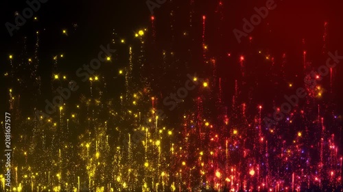 Gold and red sparks soared against the dark background.