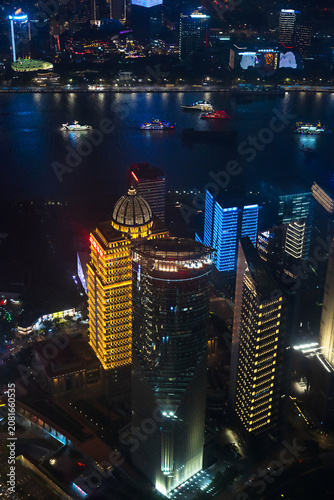 Photography Scenery of city skyline at night with illuminated skyscrapers and river in chine