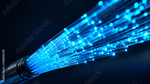 Close-up of vibrant blue fiber optic cables, symbolizing high-speed internet connectivity and advanced technology innovations.