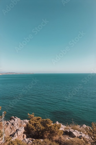 Ocean View From a Rocky Cliff on a Clear Day Near the Coast