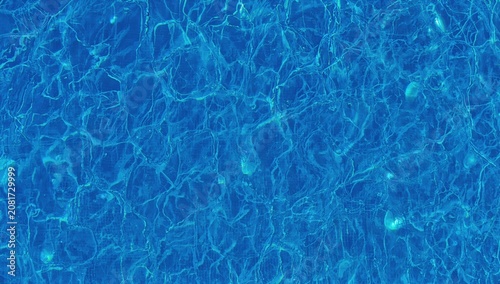 Bright Blue Water Surface With Ripples Reflecting Light From Above