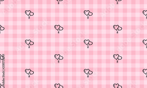 Seamless pattern of small hand drawn black hearts on pastel pink plaid grid