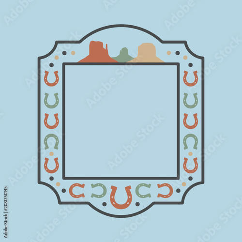 Western style frame with horseshoes and desert mesas