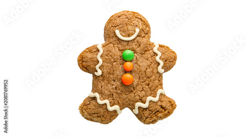 Obraz na plátně Gingerbread man cookie with white icing smile and candy buttons, isolated on tra